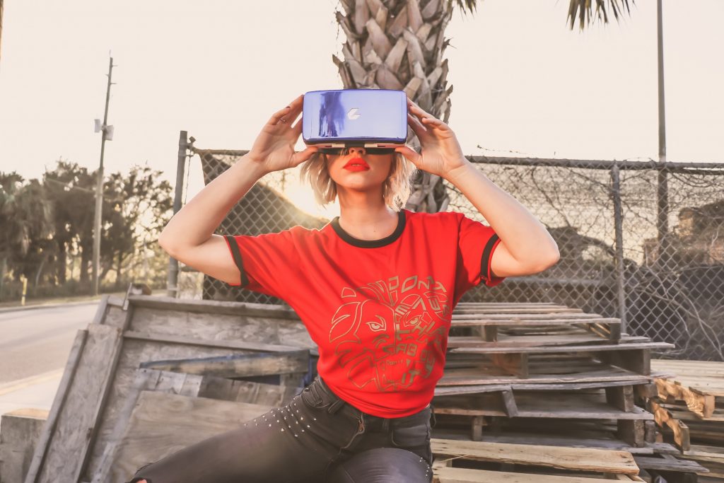 woman-in-red-crew-neck-t-shirt-wearing-virtual-reality-911601